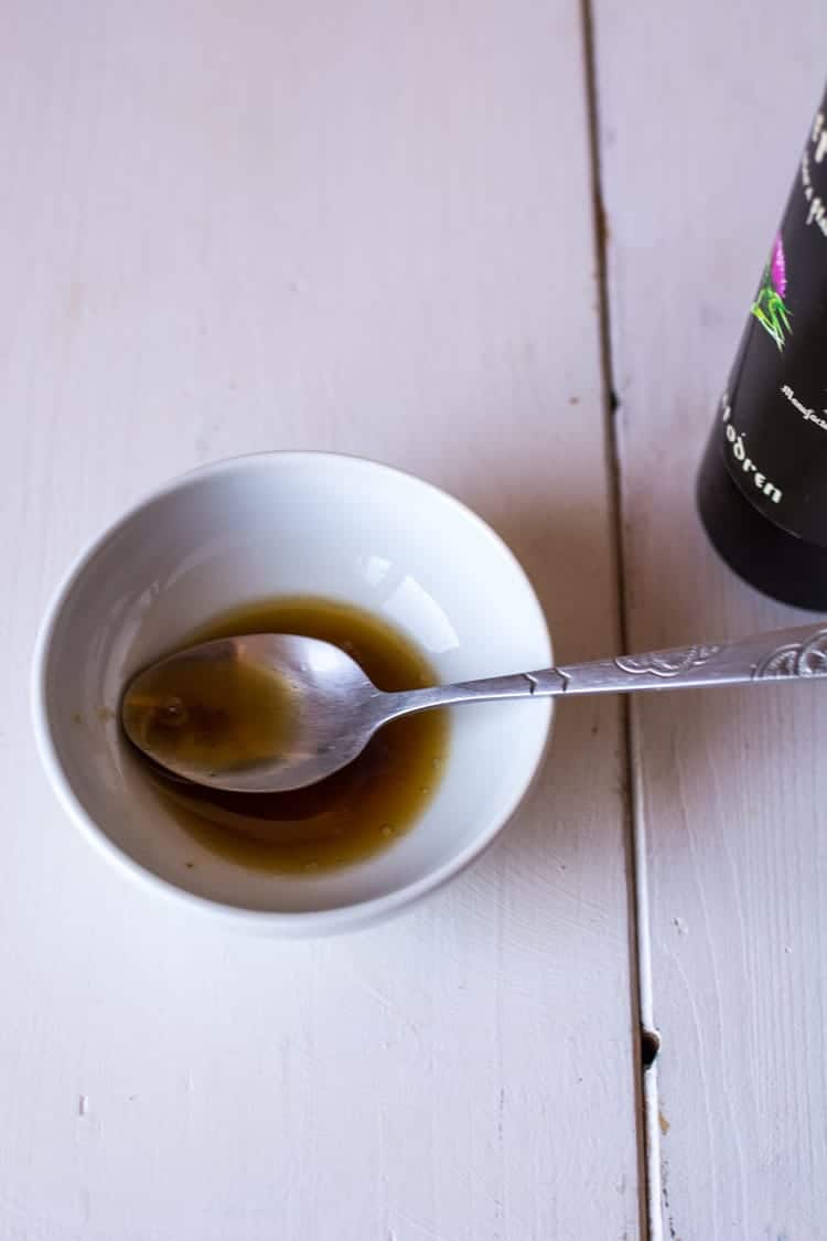 Easy Crispy Roasted Brussels Sprouts mix vinegar and maple syrup
