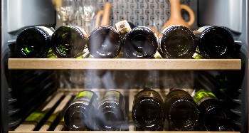 Wine,Bottles,Cooling,In,Refrigerator Wine,Bottles,Cooling,In,Refrigerator
